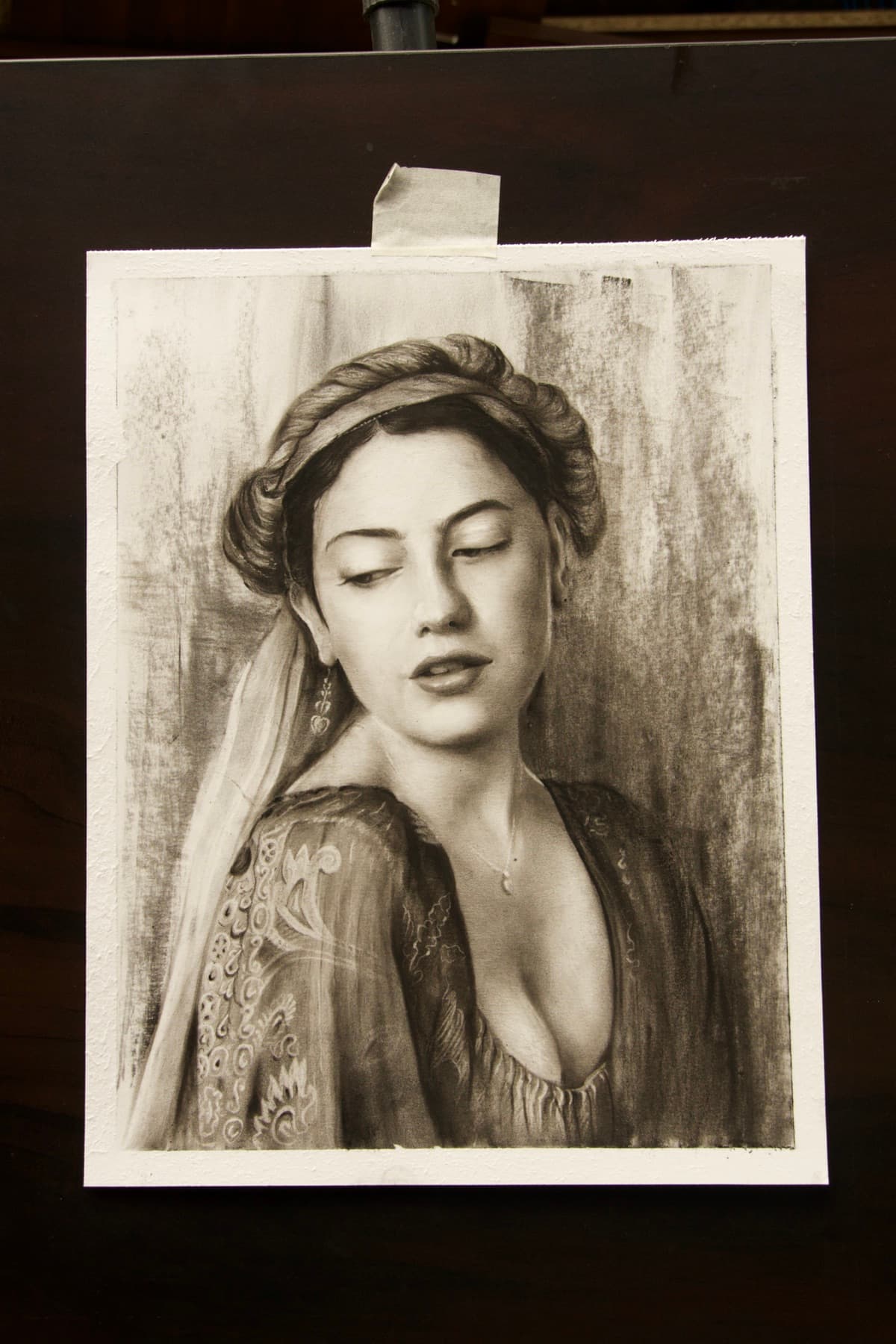 Finished charcoal portrait study on paper